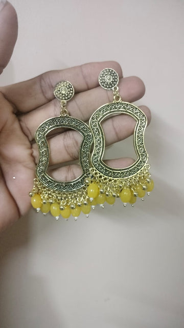 resin jhumka base with yellow beads golden