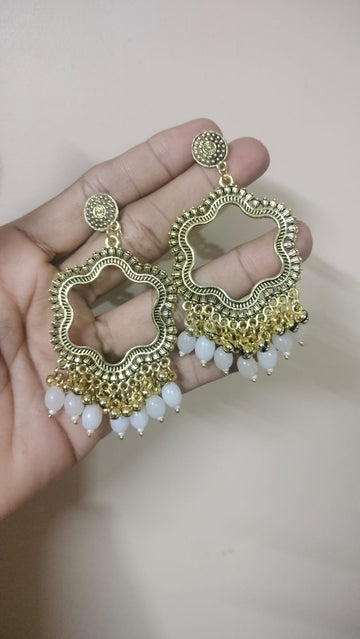 Flower shape resin jhumka base with white beads  golden