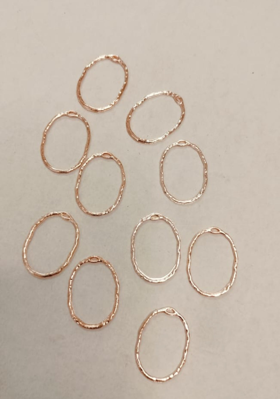 Rose gold oval bezel