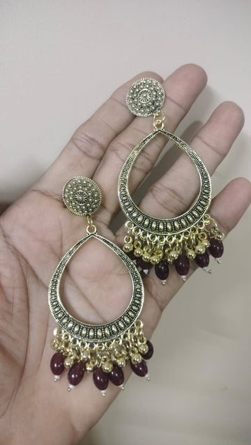 Drop shape resin jhumka base with maroon  beads