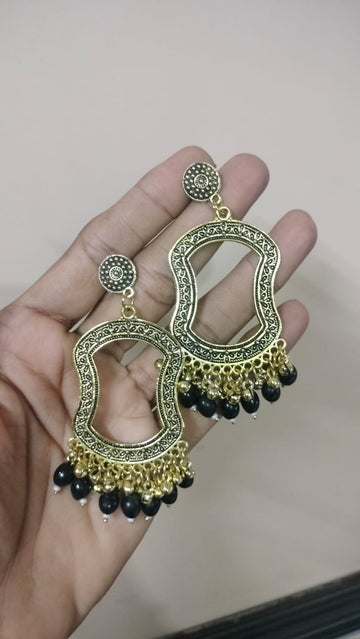 resin jhumka base with black  beads  golden